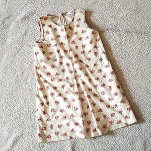 Never worn. Tags lost. Brooks Brothers dress. Size 10. Color ivory.